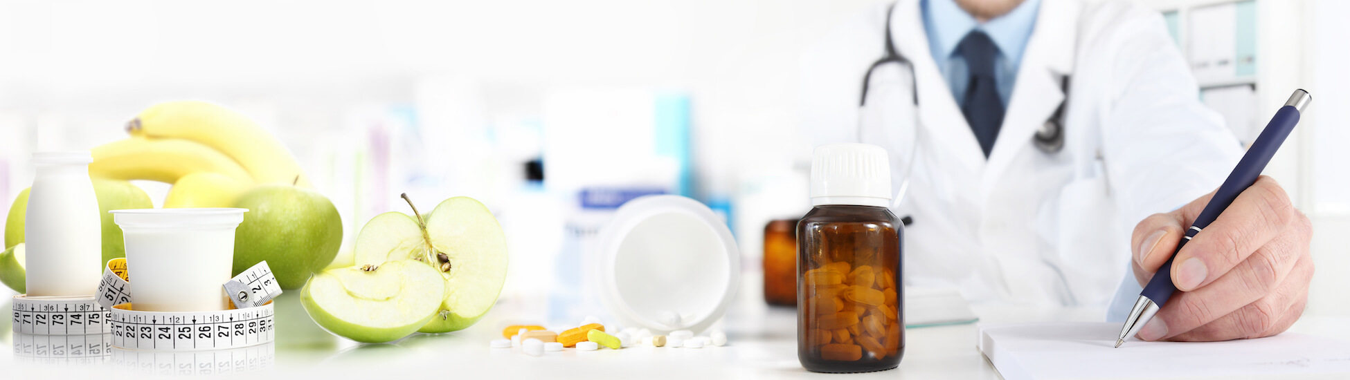 Apotheco Holistic Approach Blog - Table in pharmacy with pills and apples