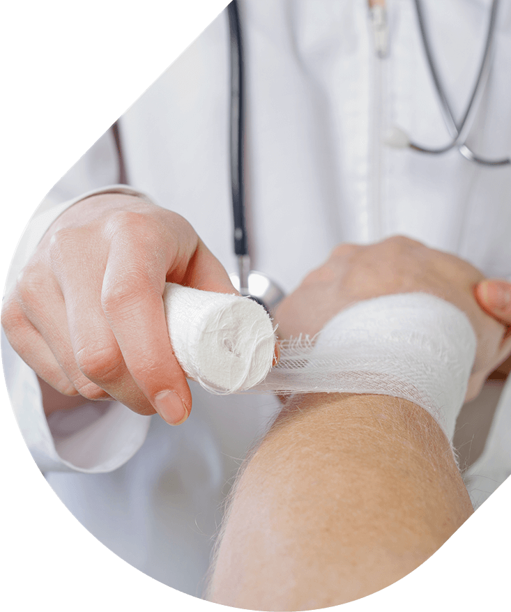 Apotheco Wound Care - Doctor wrapping patient's wrist with medical wrap