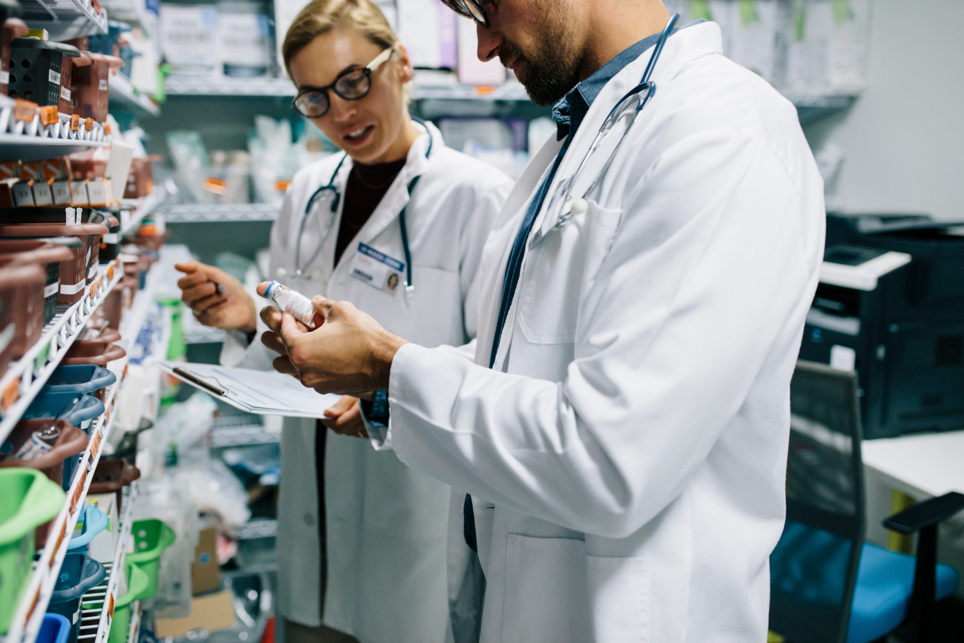 Pharmacists Checking Inventory At Pharmacy Apotheco Pharmacy